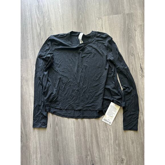 Lululemon Tops - NWT Lululemon modal relaxed fit lounge long sleeve size 4